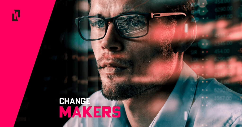 A focused man wearing glasses with computer screen reflections, conveying a theme of 'Change Makers' with digital elements in the background.